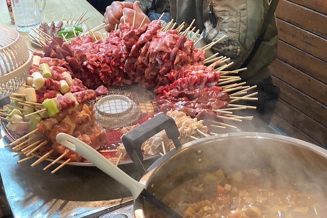 Tokyo Shinjuku Japanese Local Bar Hopping and Food Tour - Omoide Yokocho: a first taste in a narrow lane