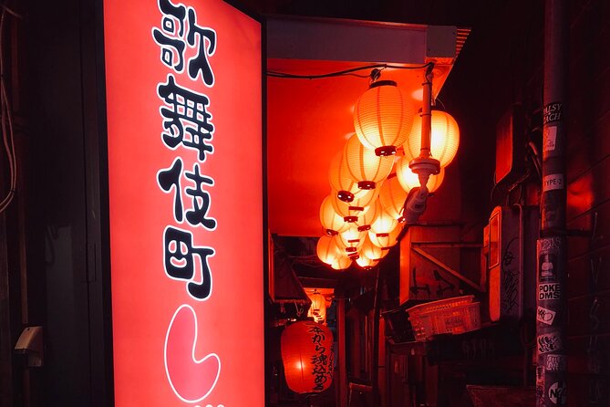 Tokyo: Shinjuku Local Bar & Izakaya Crawl Tour - Walking through Kabukicho after dark