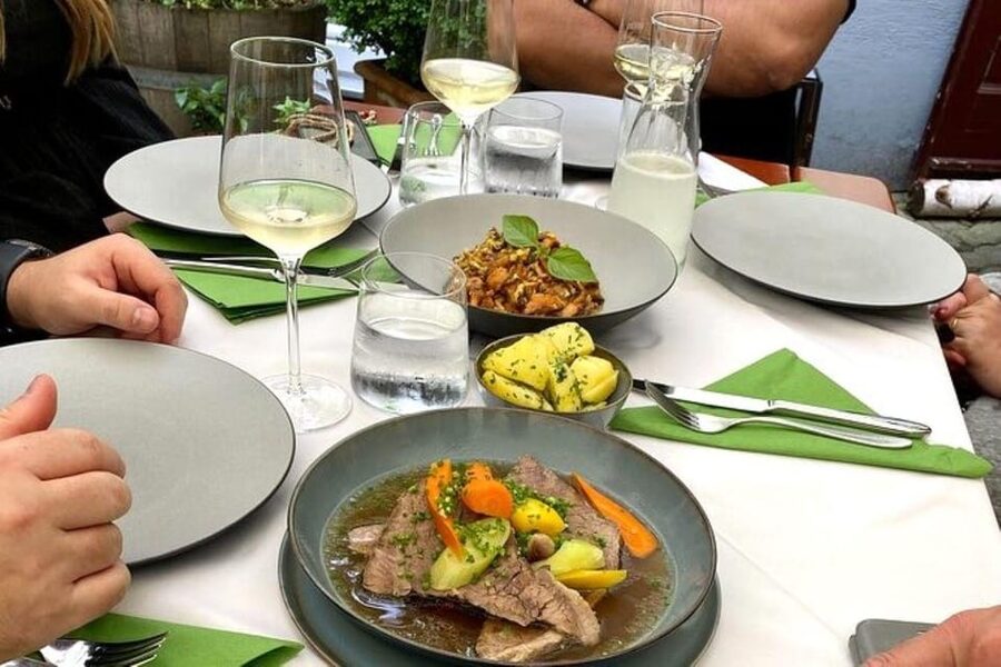 Vienna Nightlife Tour: Dinner, Drinks & Rooftop Bar - Rooftop views or a riverside finish